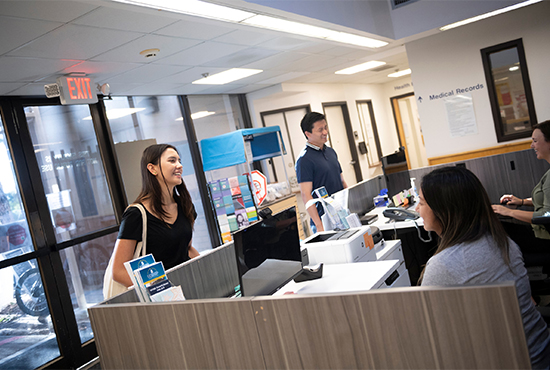 Student at student health front desk